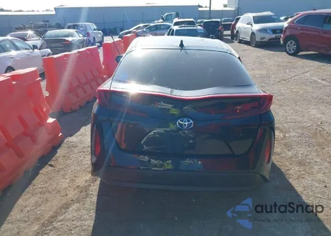2021 Toyota Prius Prime Limited z USA, uszkodzony, nr VIN JTDKAMFP5M3195132